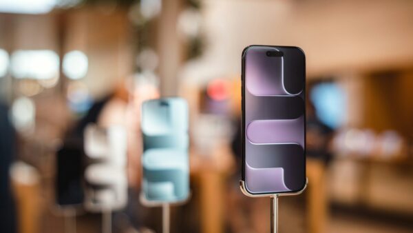 Smartphones displayed on stands in a phone shop
