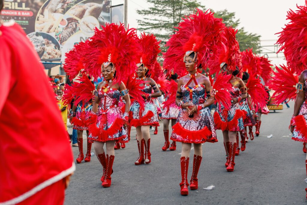 A group of women in red and pink carnival costumes in Calabar